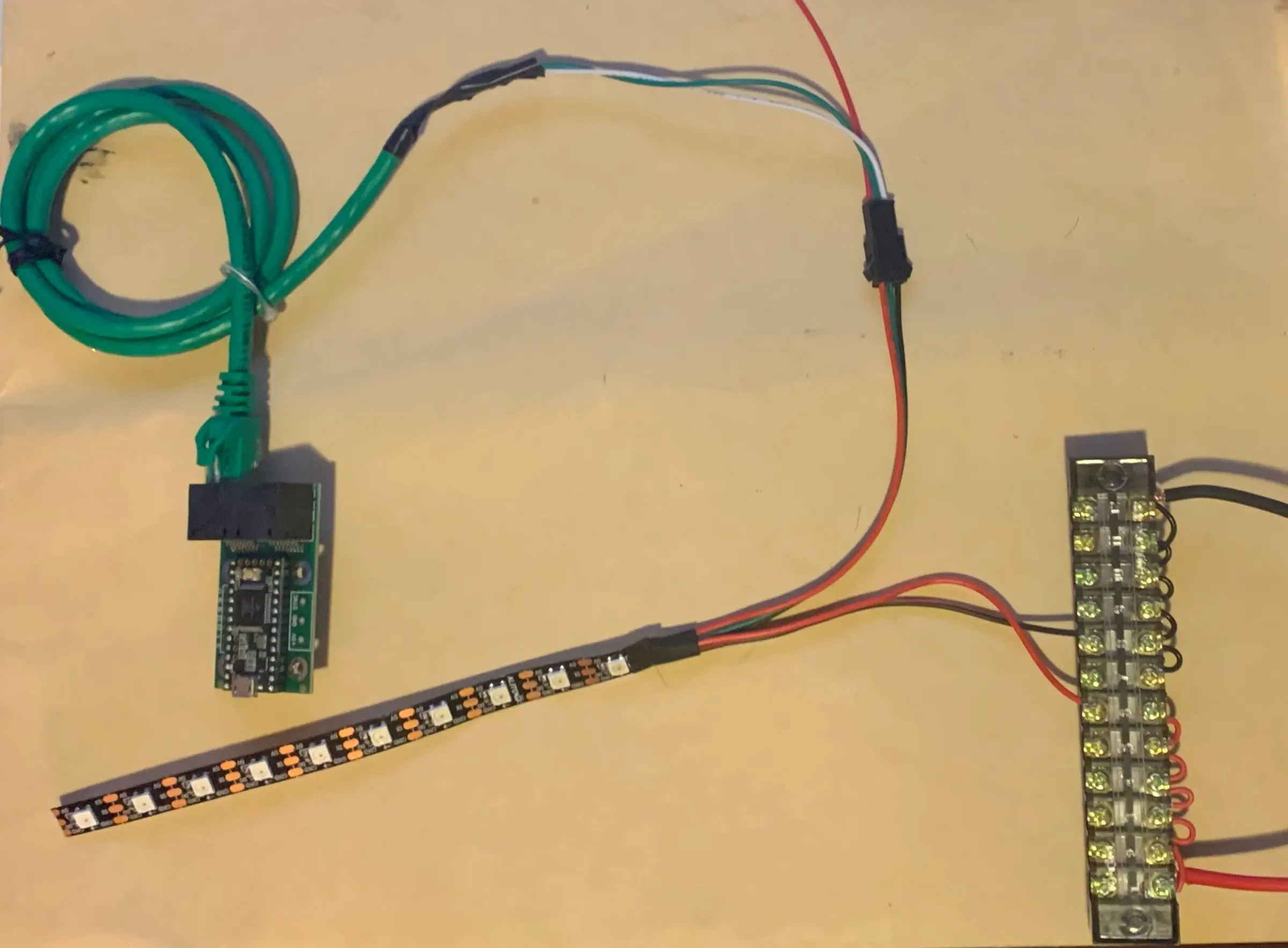 Teensy -&gt; Ethernet (orange and white) to JST (green and white, red doesn’t matter) -&gt; LED strip JST. Power and ground from LED strip to terminal block. The ground from the teensy is connected to the ground from the led strip. If there is no JS…